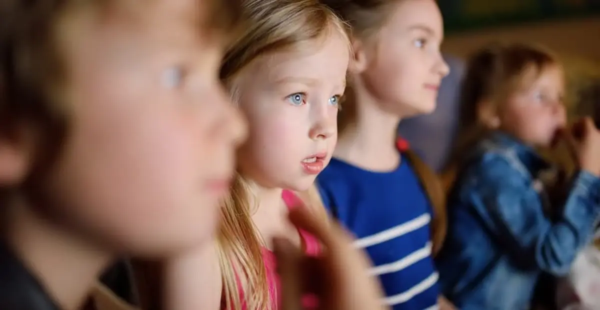 Bigstock Four Cute Kids Watching A Movi 348215728