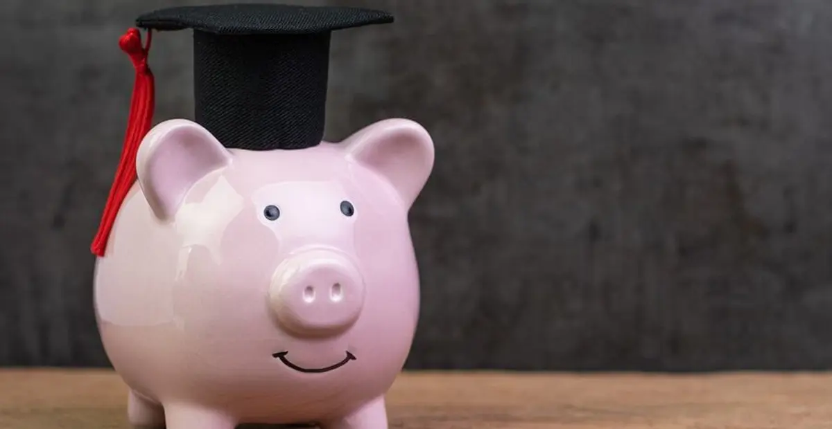 Bigstock Smiling Pink Piggy Bank Wearin 319058059