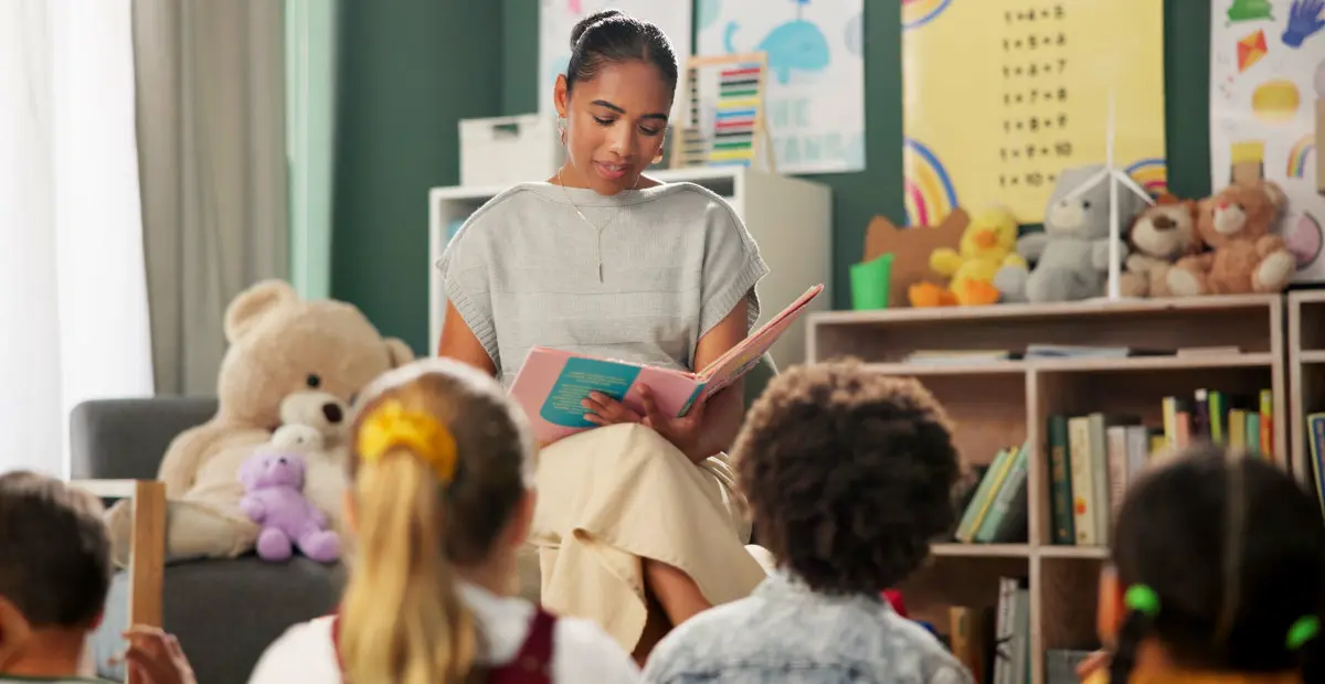 Kindergarten teacher and reading a story to child 2025 04 06 10 32 39 utc