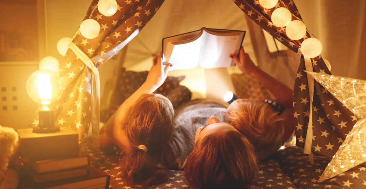 Parent reading with child before bed caregiver support Kids Read Now 2 scaled
