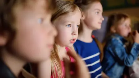 Bigstock Four Cute Kids Watching A Movi 348215728
