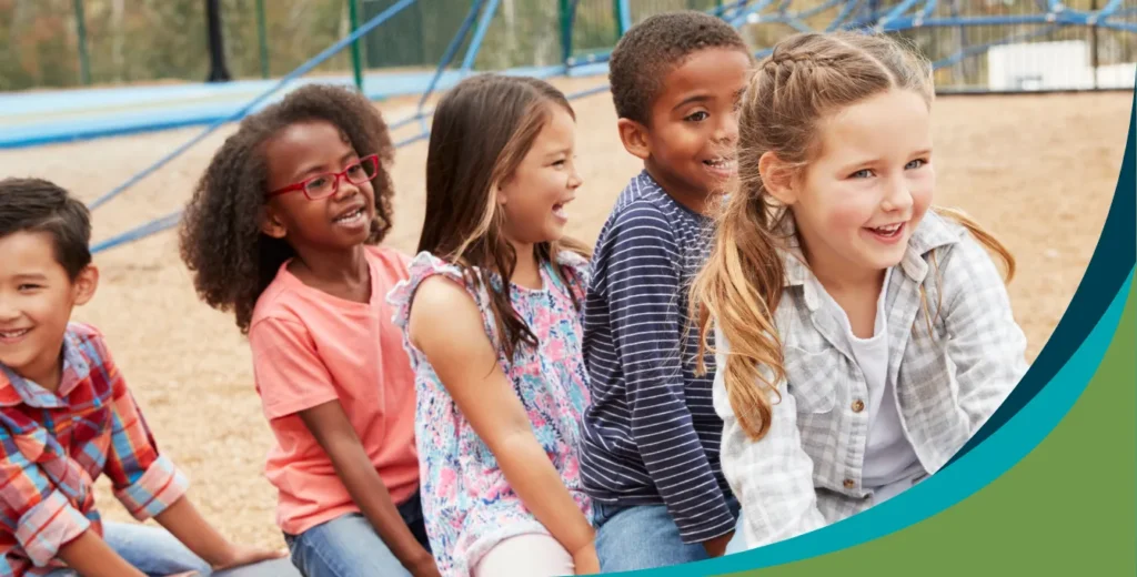 Six kids in grades K-5 outside school on playground, accelerating - fluency - Kids Read Now