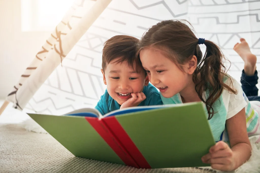 2 young students reading at home - fluency - Kids Read Now